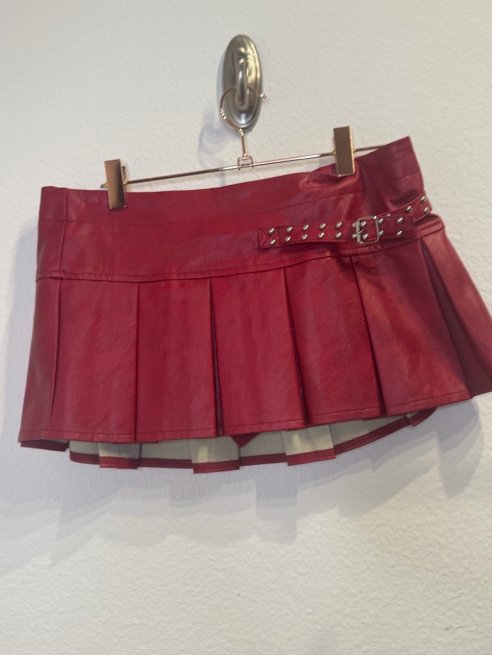 Edikted Red Pleated Faux-Leather Mini Skirt with Studded Belt Detail